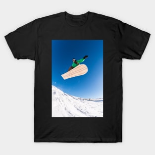 Snowboarder jumping against blue sky T-Shirt